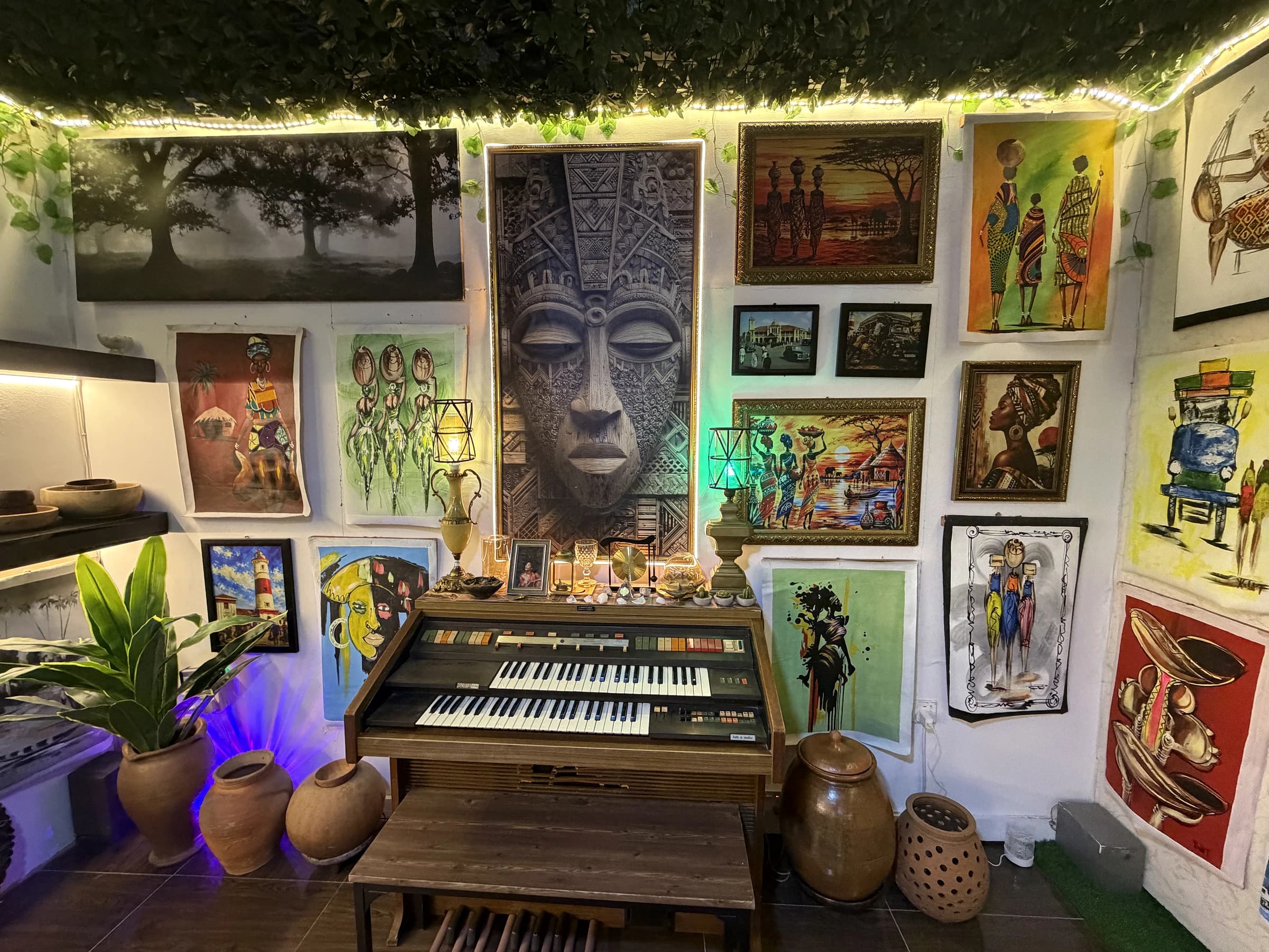 Paintings displayed across the Gbawe Art Center wall